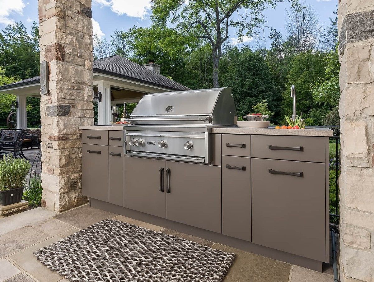 There is a grill in the middle of the kitchen.