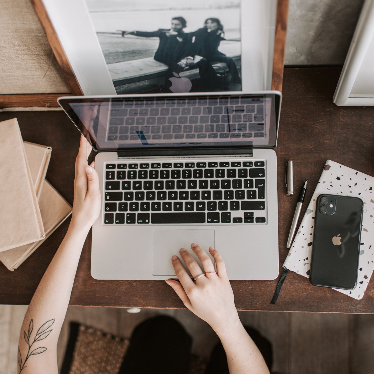 Image of a woman working with her laptop at Overseas Filipino Workers