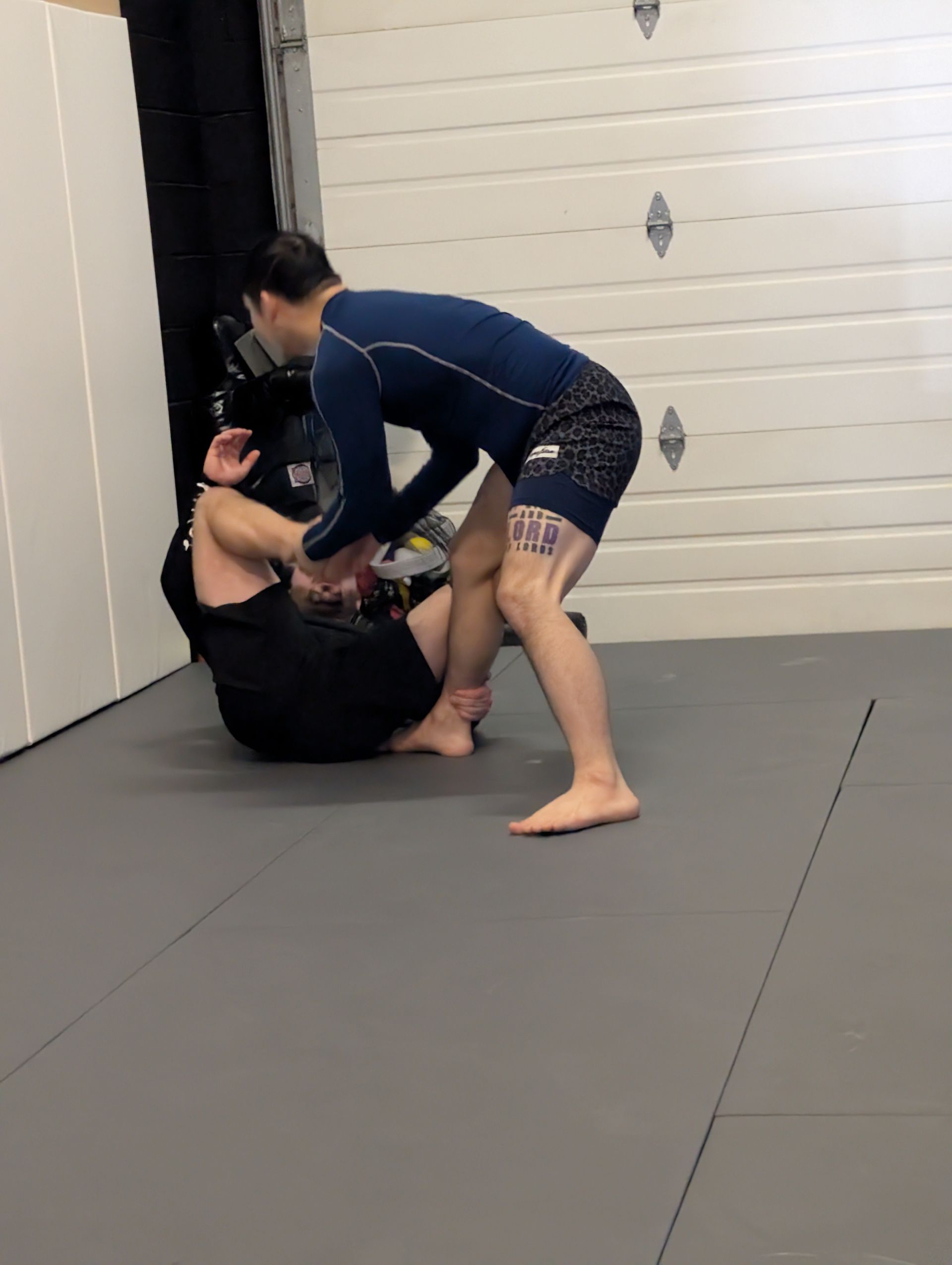 Students practice Brazilian Jiu-Jitsu drills at Lucky Cat Grappling Co. in Manalapan, NJ.