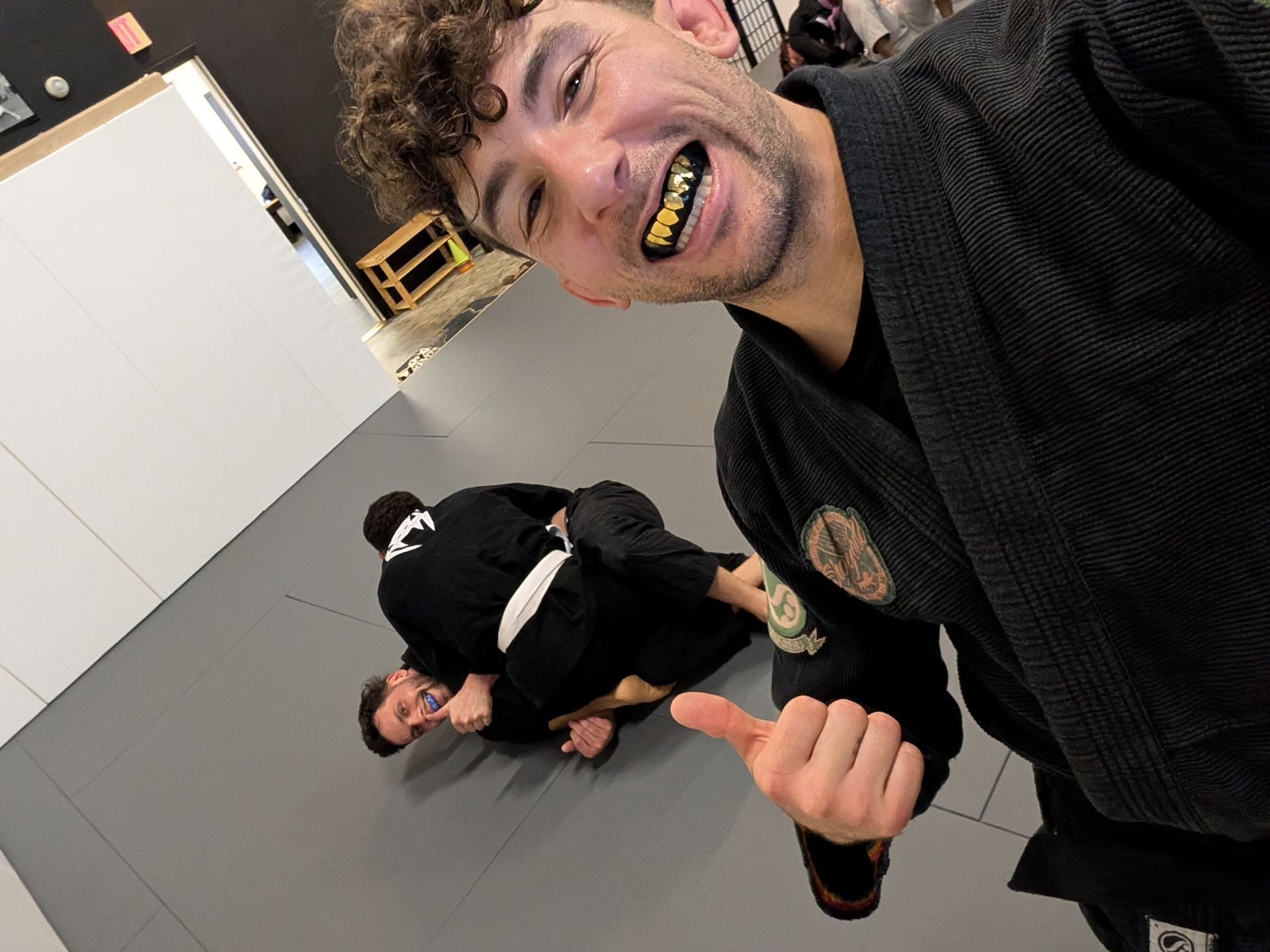 Students practicing Jiu Jitsu drills at Lucky Cat Grappling Co. in Manalapan, NJ, building confidence and fitness