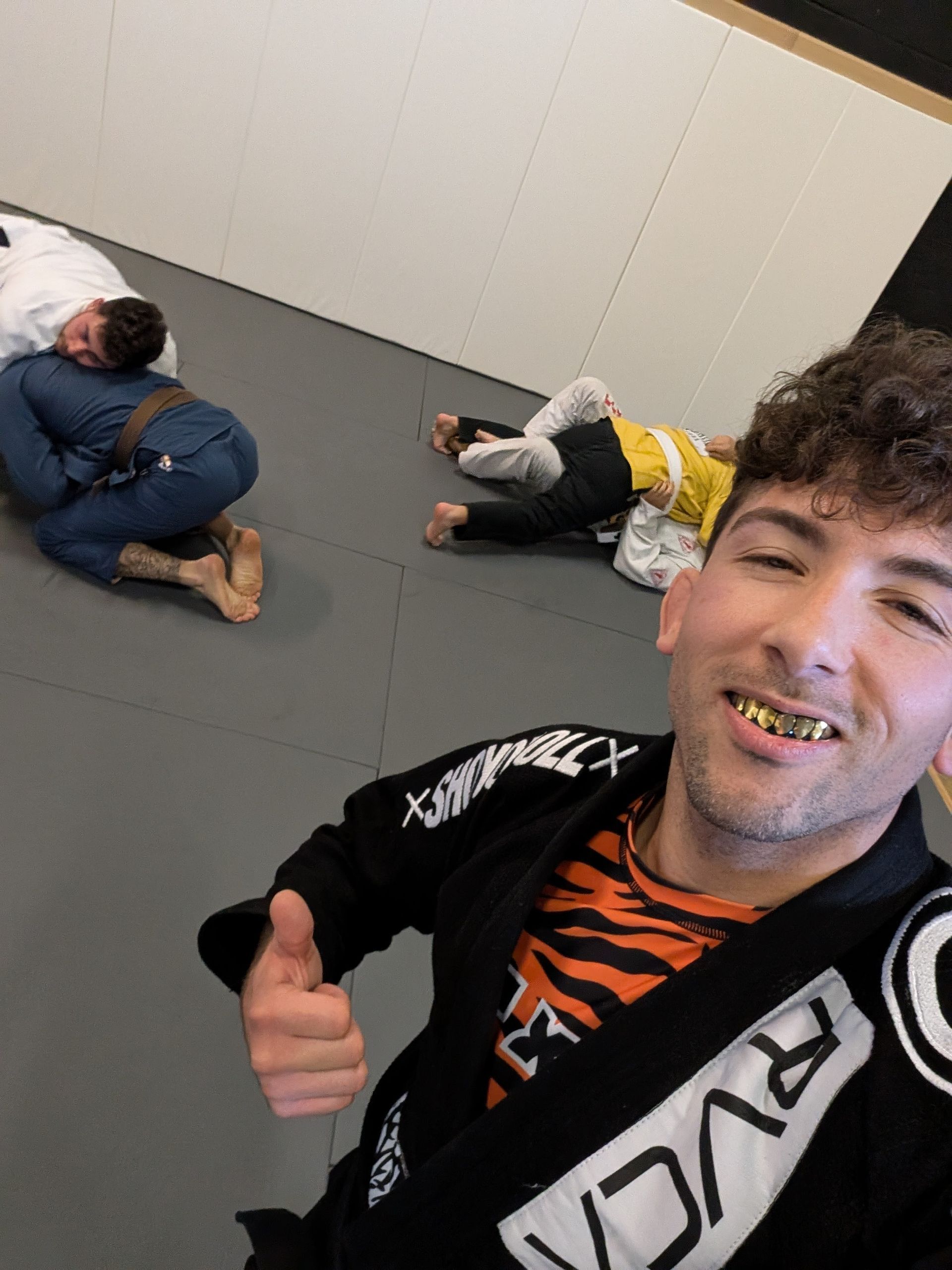 Students drilling Jiu Jitsu escapes at Lucky Cat Grappling Co. in Manalapan, NJ to build focus and calm