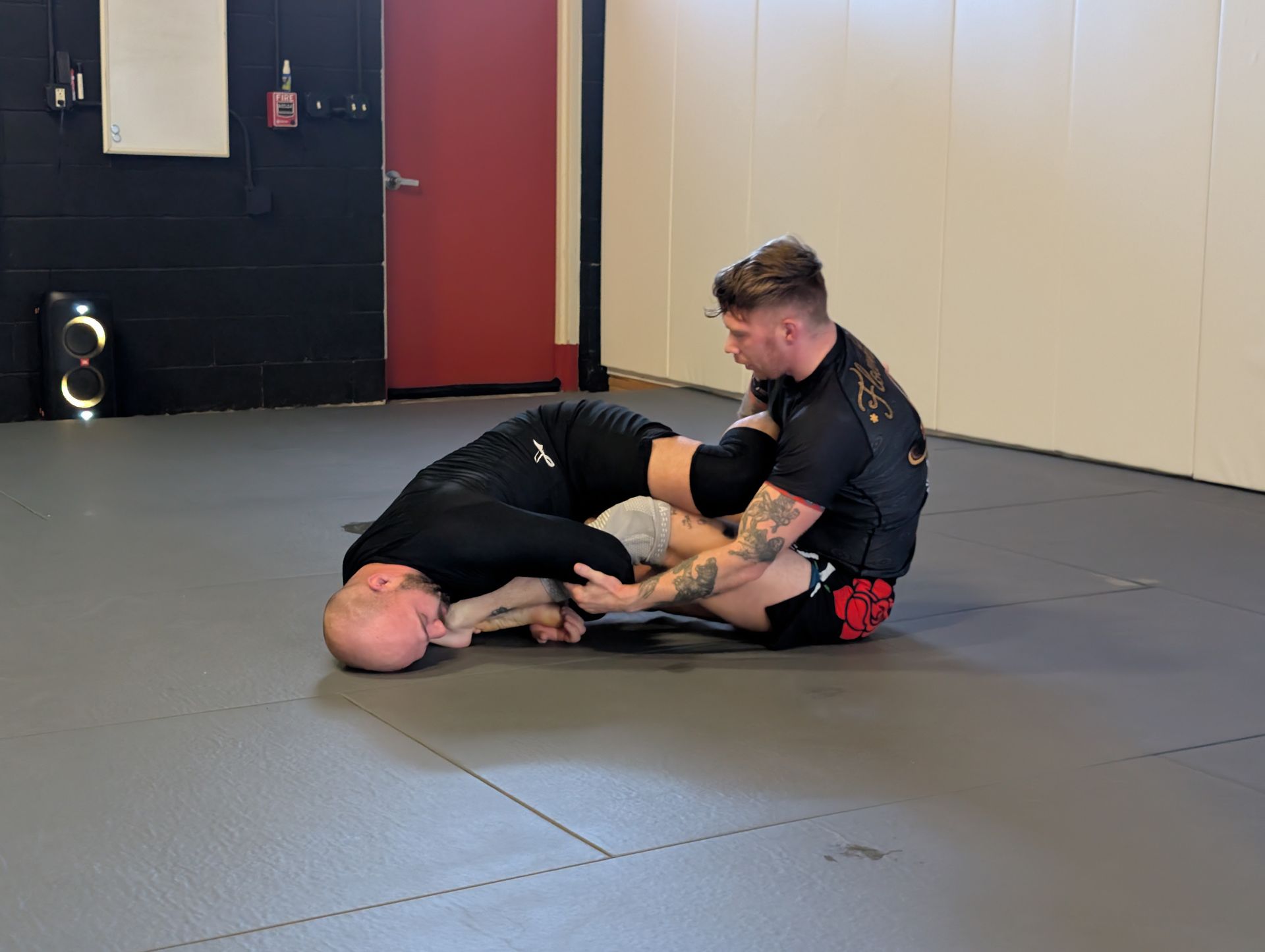 Family Brazilian Jiu-Jitsu class at Lucky Cat Grappling Co. in Manalapan, NJ building confidence.