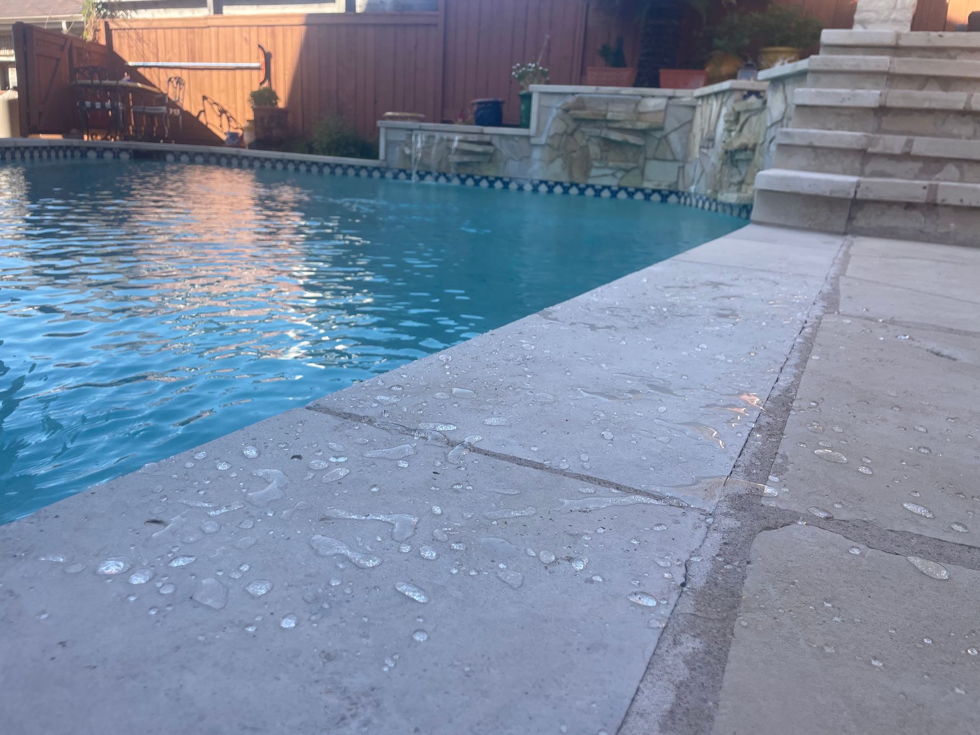 A close up of a brick wall made of different types of bricks