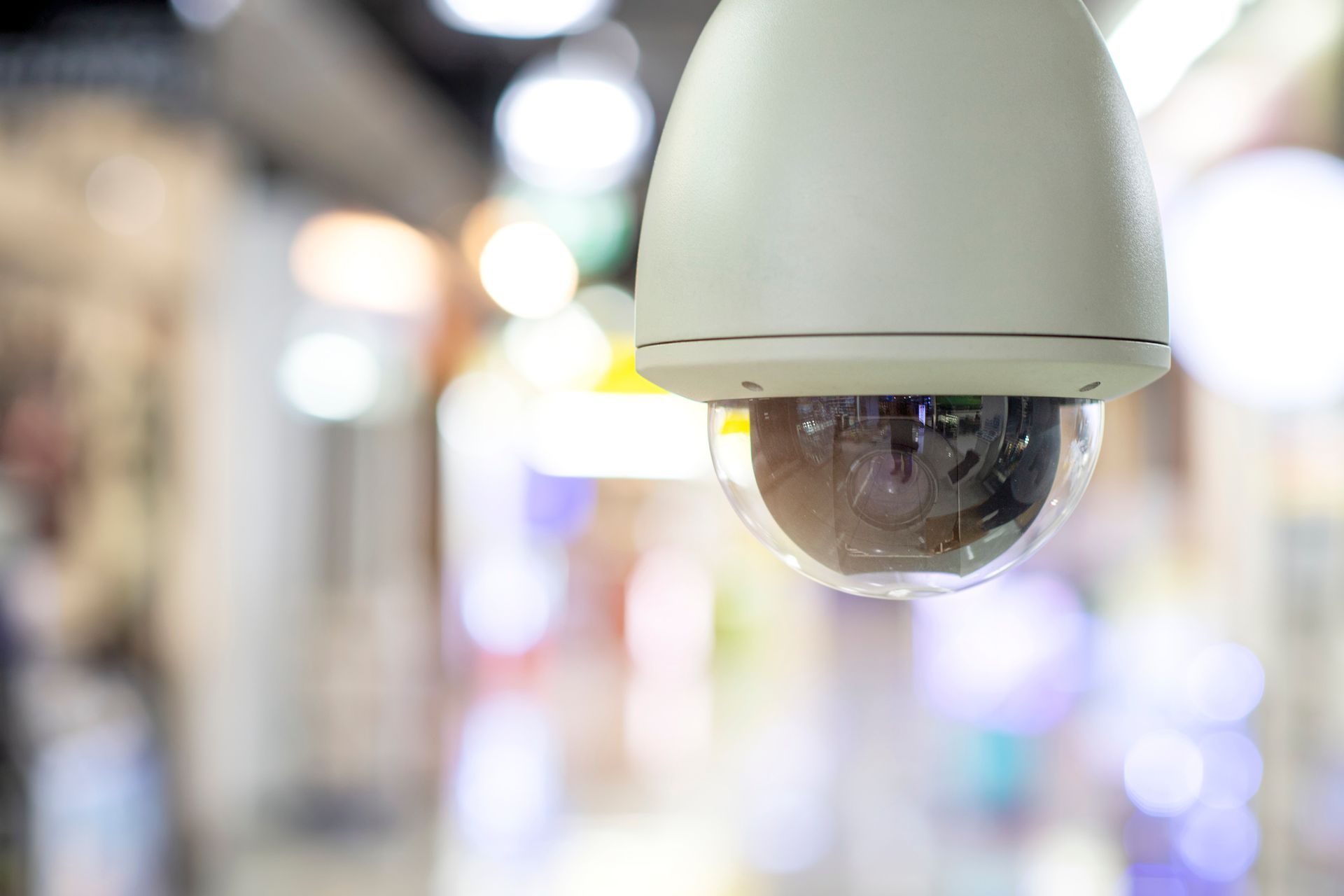 CCTV security camera dome type installed in a shopping mall by Alamo Alarm Company Inc. for commerci