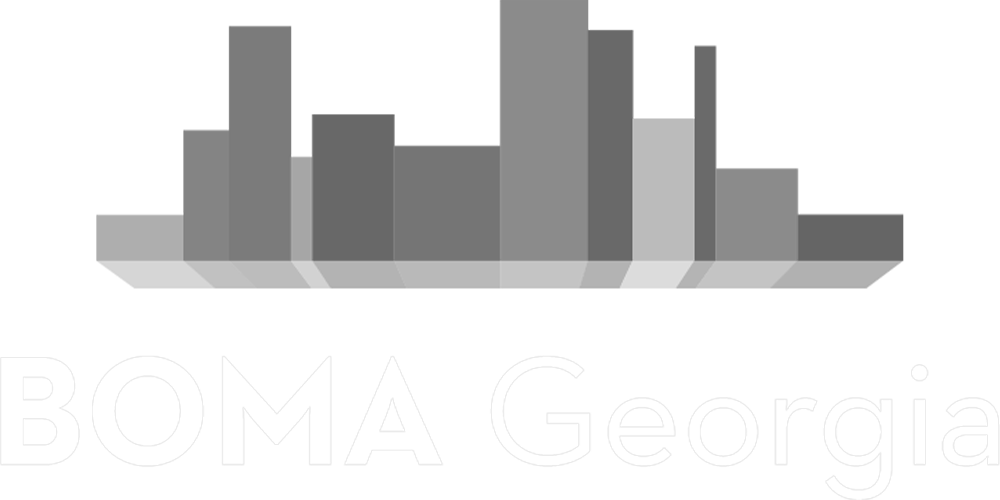 A black and white illustration of a city skyline.