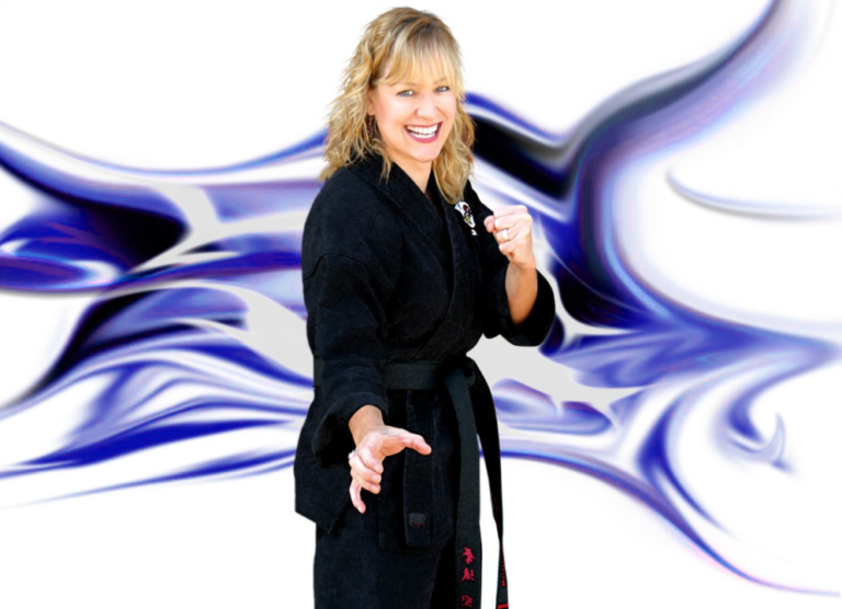 A woman in a black karate uniform is smiling