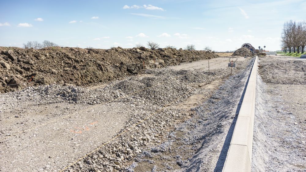Construction Site With Gravel Road Under Development