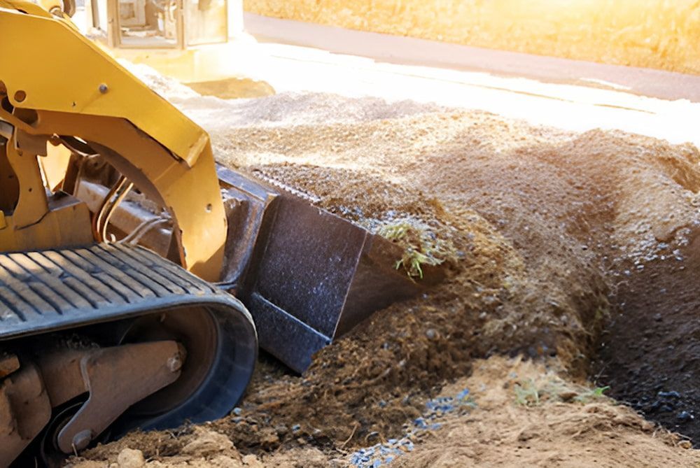 A Bulldozer Is Digging A Hole In The Ground — Jeff Thompson Excavator Hire Pty Ltd In Pink Lily, QLD