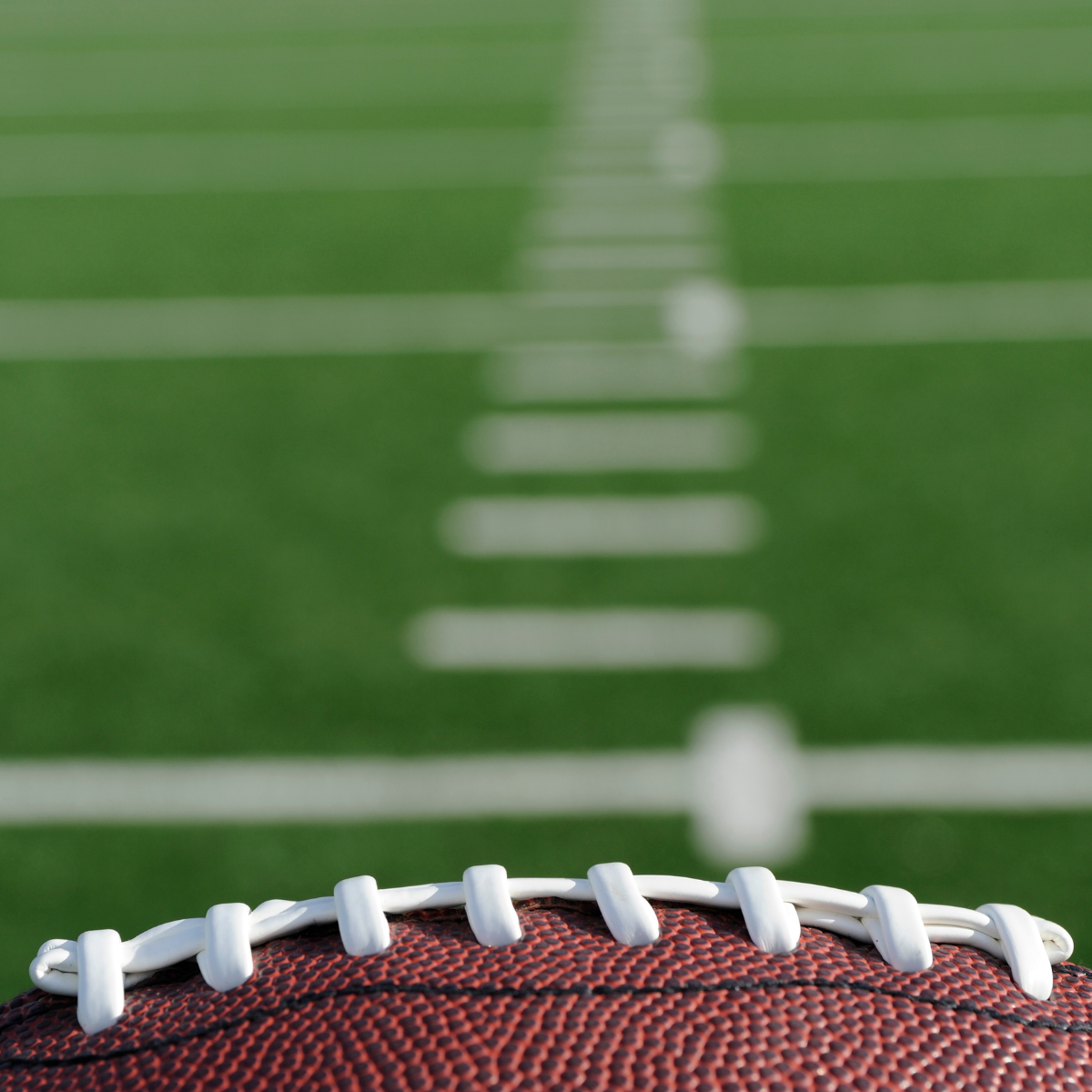 A close up of a football on a field