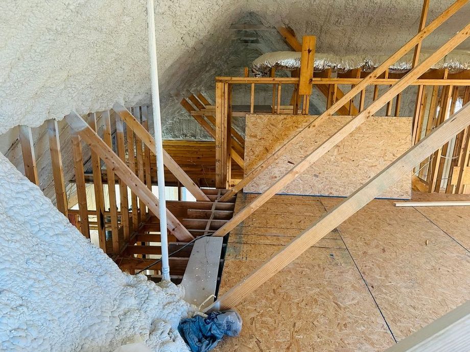 A staircase is being built in the attic of a house