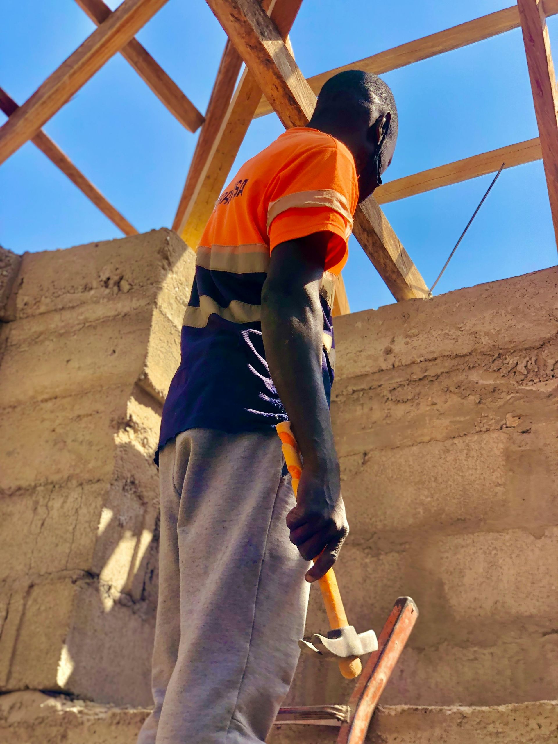 A roofing profesisonal working on a new project