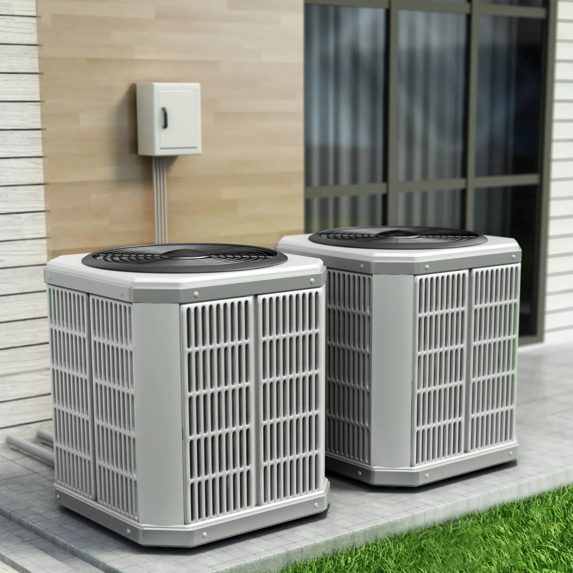 Comfort Air Solution LLC - Two air conditioners are sitting on the side of a house.