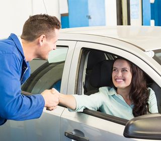 Collision Repair — Woman Shaking Hand of Mechanic in Mount Vernon, NY