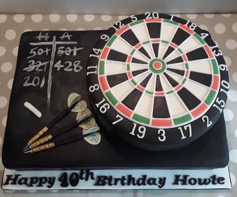 Dartboard cake with chalk and darts created by A Cherry On Top, Isle of Wight.