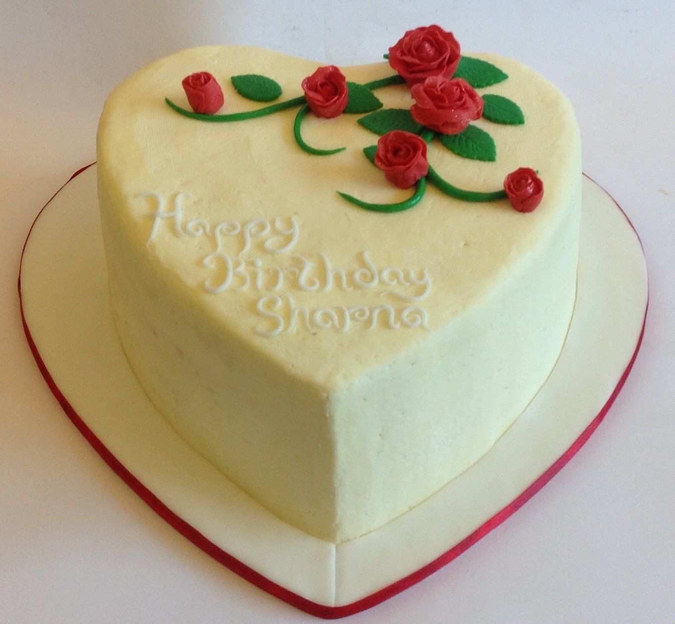 Heart shaped buttercream cake with roses created by A Cherry On Top, Isle of Wight.