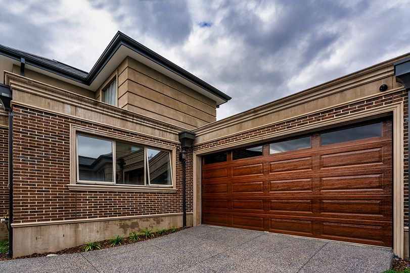 Lincoln Panel Timber FX Walnut with plain tinted windows -Sectional/Panelift Doors in Wollongong, NSW