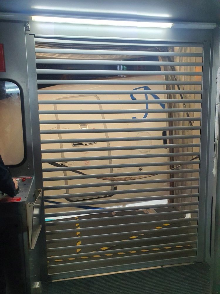 Door Inside Aerobridge Brisbane Airport — Window Shutters in Wollongong, NSW