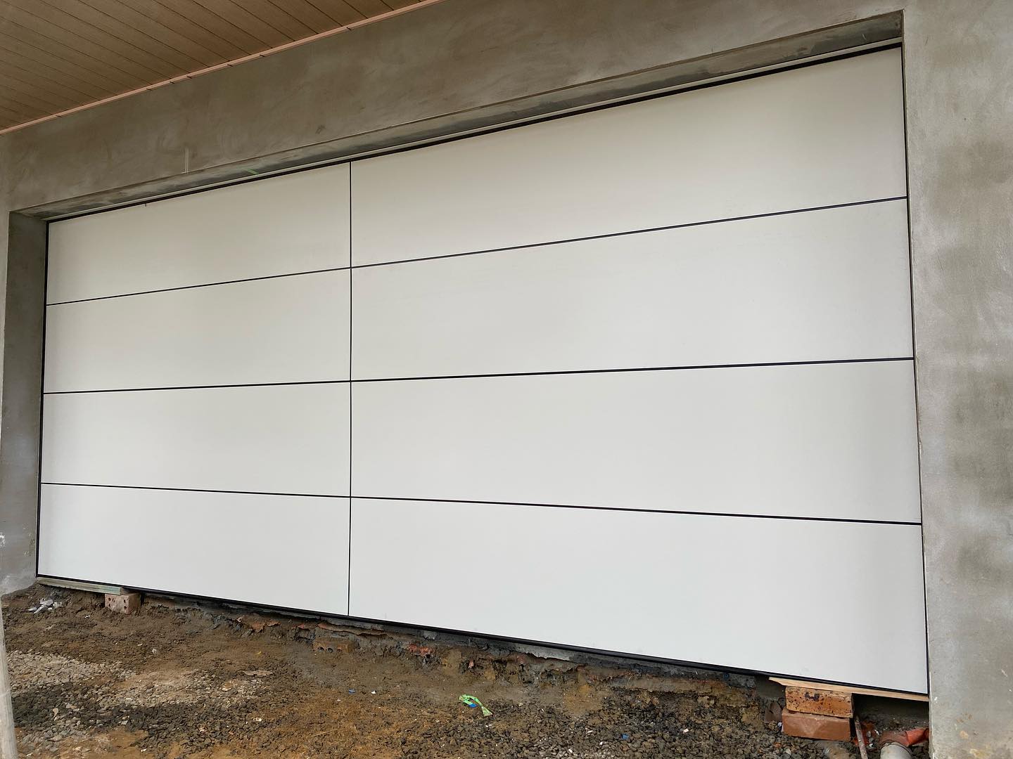 Modern White Panel Garage Door — Garage Doors in Wollongong, NSW
