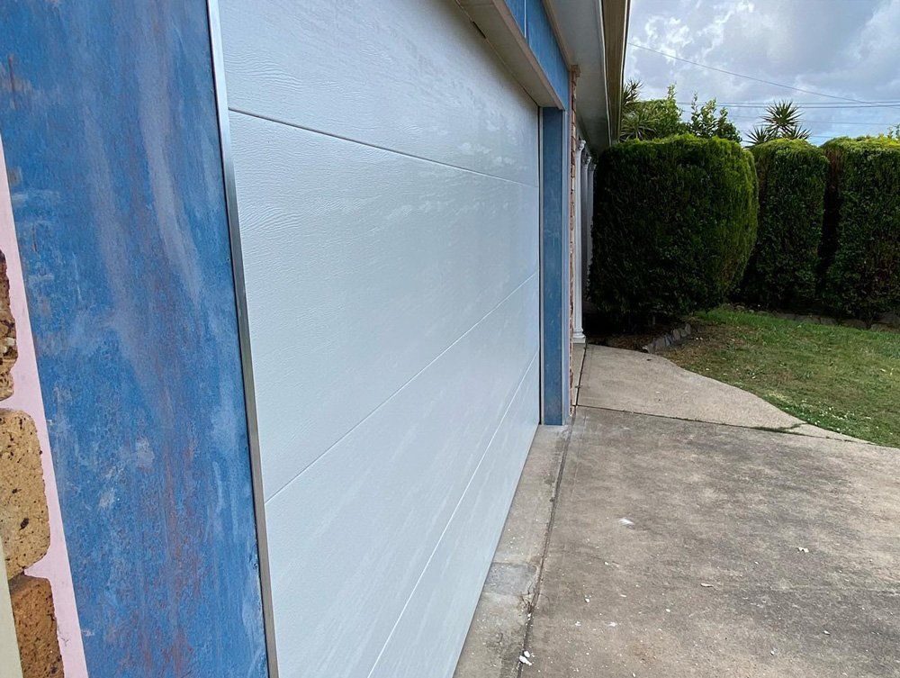 New White Residential Garage Door — Garage Doors in Wollongong, NSW