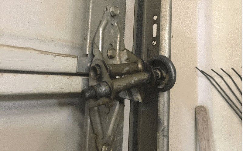 Broken Roller Door Wheel — Garage Door Repairs in Buli, NSW