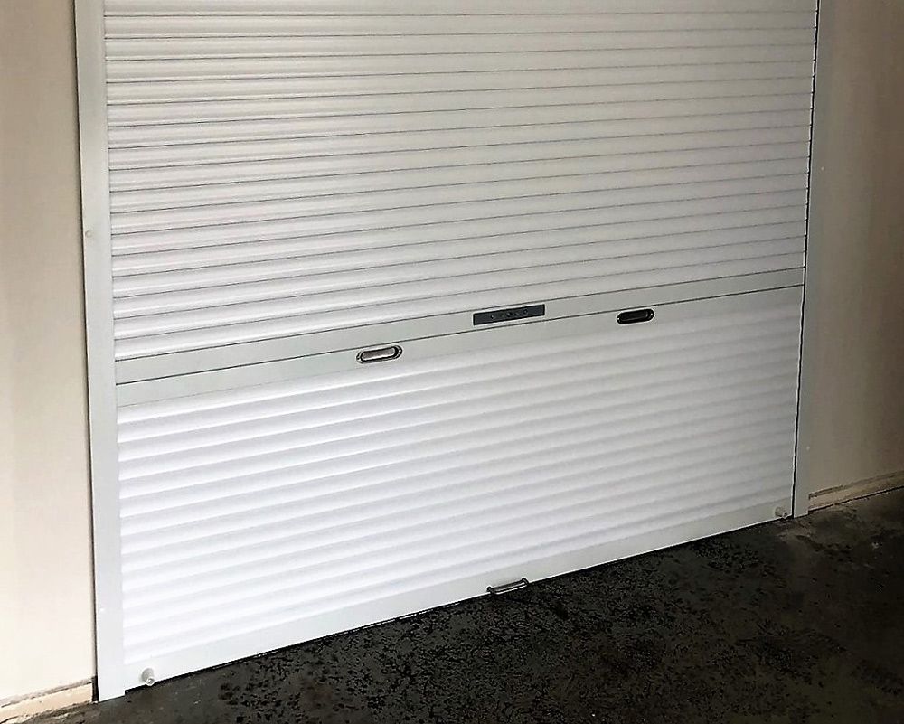 Close Up White Widespan Roller Shuter — Window Shutters in Wollongong, NSW