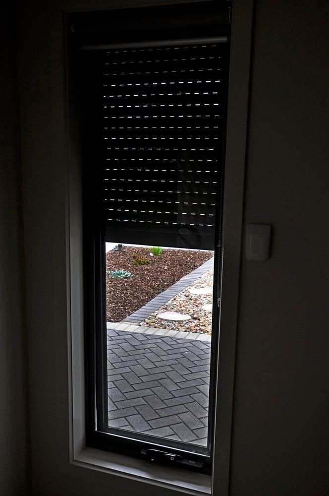 Partially Opened PowerSmart Window Shutters — Window Shutters in Wollongong, NSW