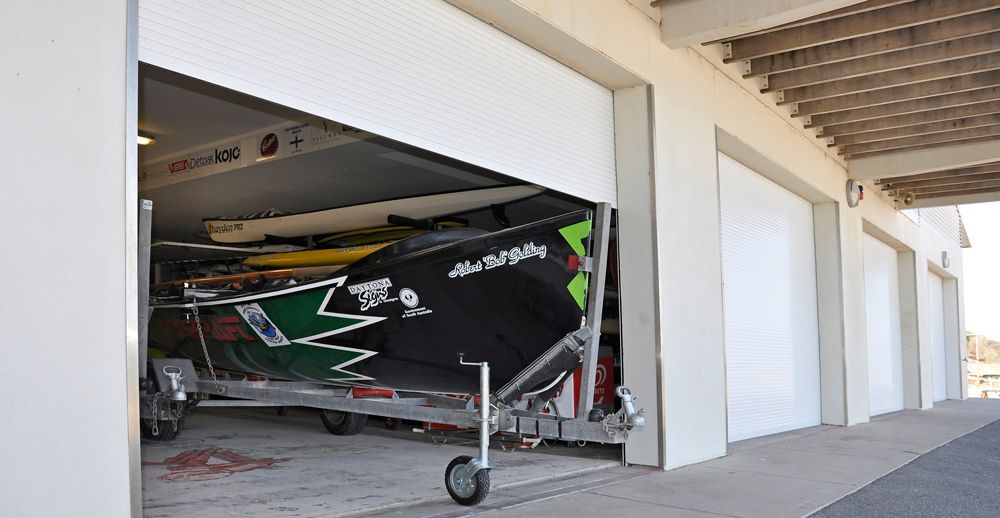 Boat Inside Garage — Window Shutters in Wollongong, NSW