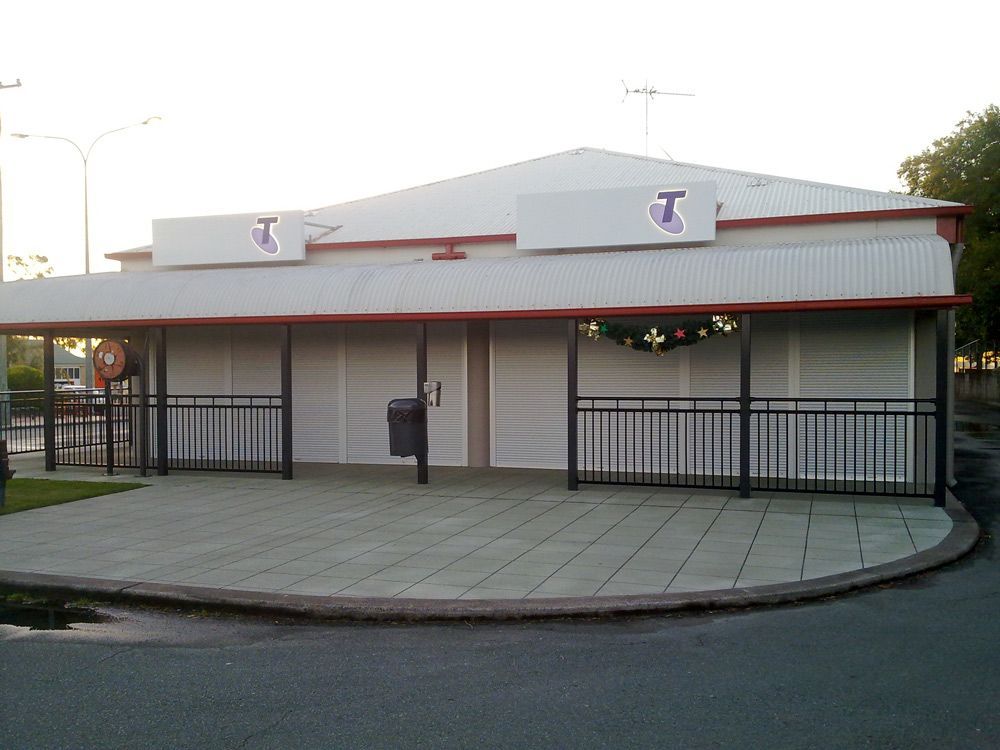 Telstra Commercial Building — Window Shutters in Wollongong, NSW