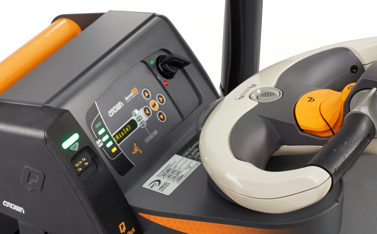 A close up of a steering wheel on a machine