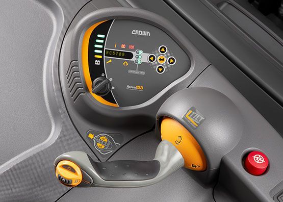 A close up of a dashboard with a red button that says ' emergency stop '