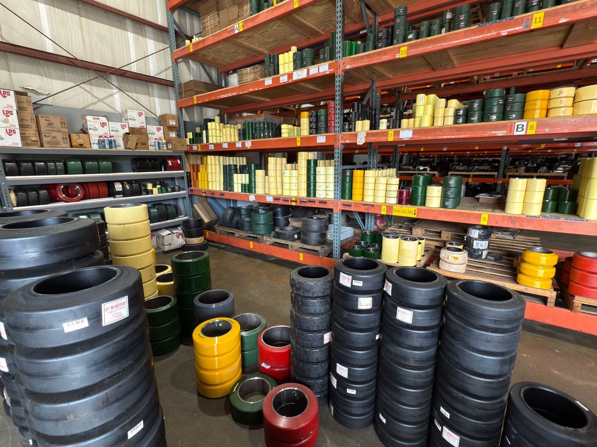 A warehouse filled with lots of different types of tires