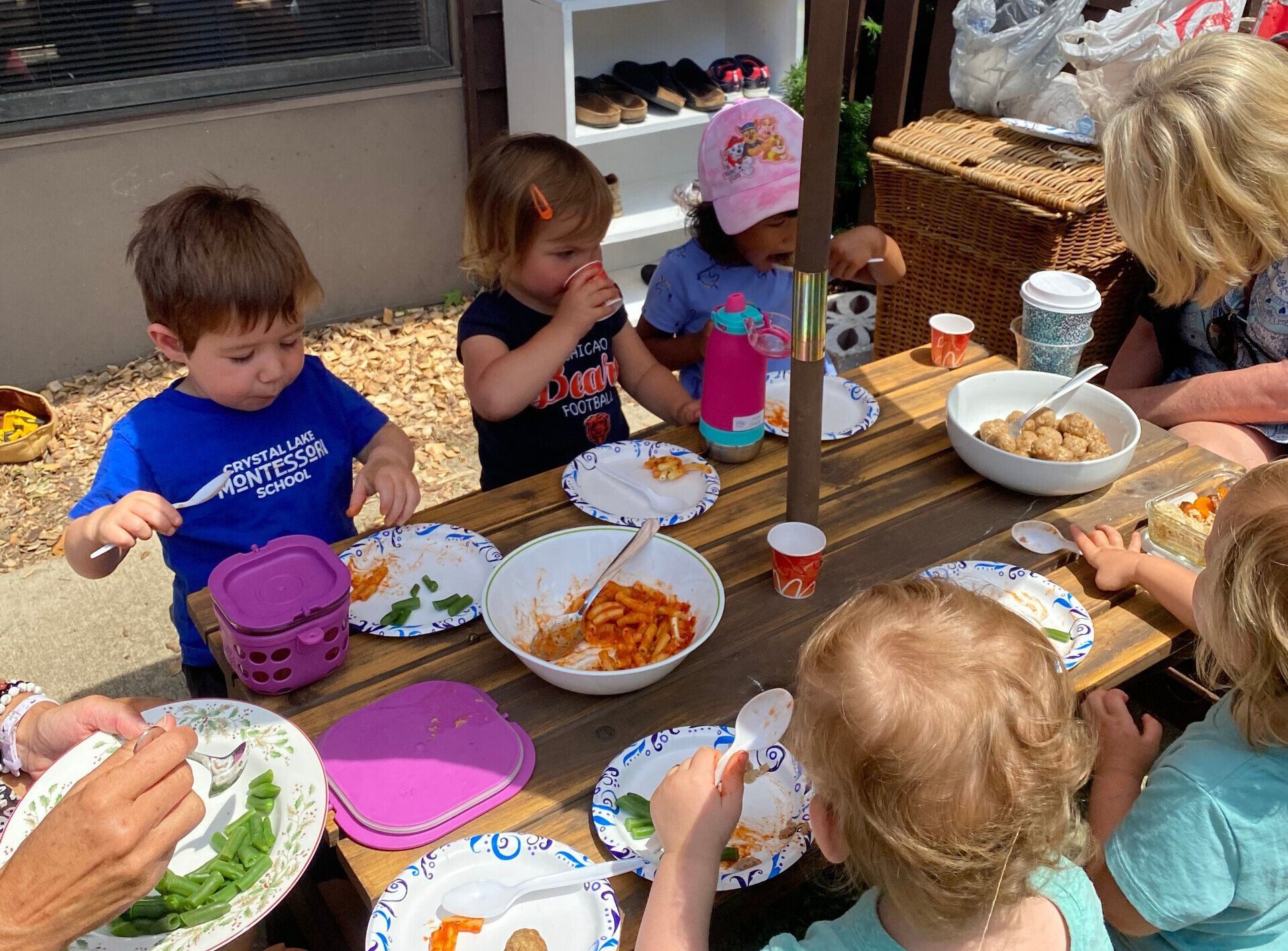 Montessori children eating