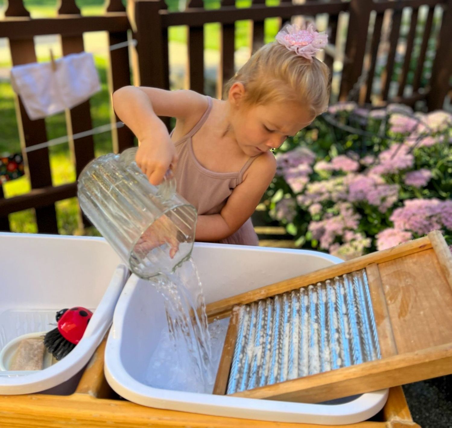 Montessori child working on practical life skills