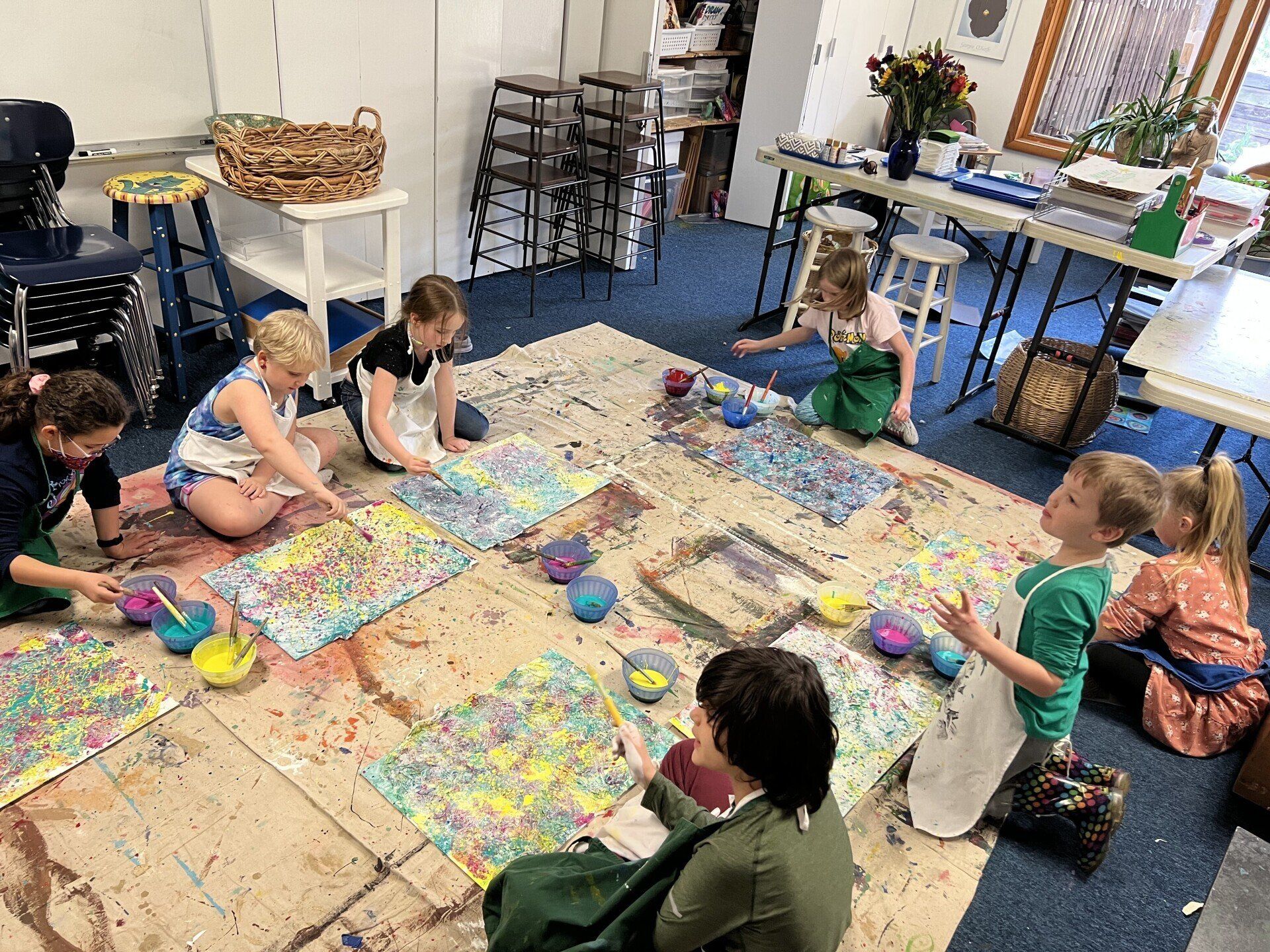 Montessori students painting