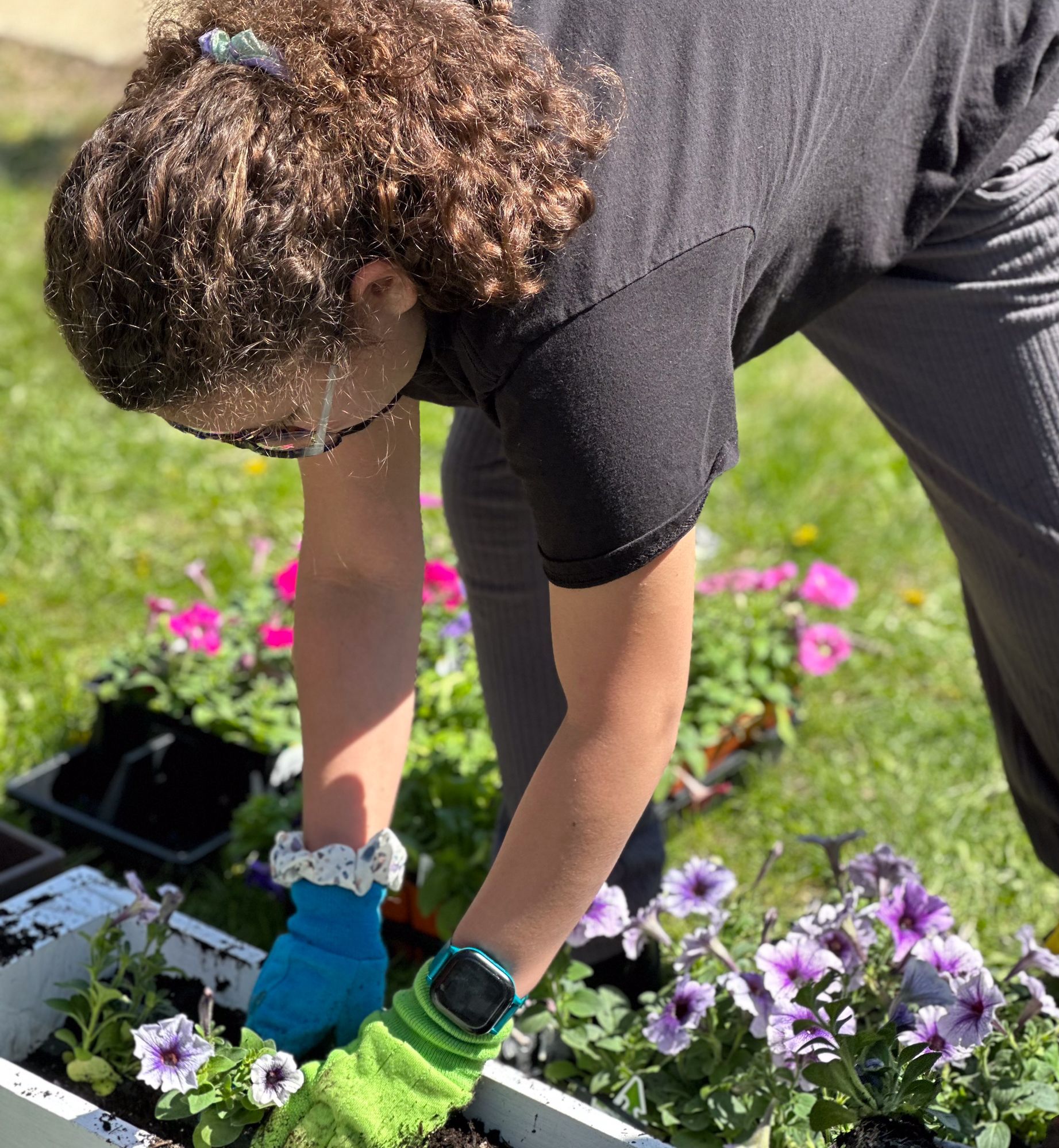 Montessori child working in the garden