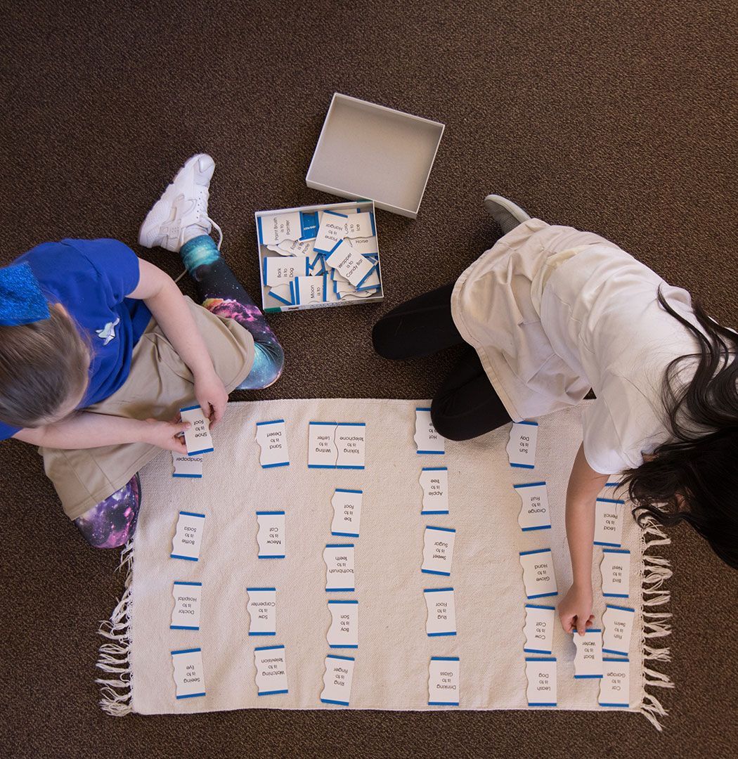 montessori children working language materials