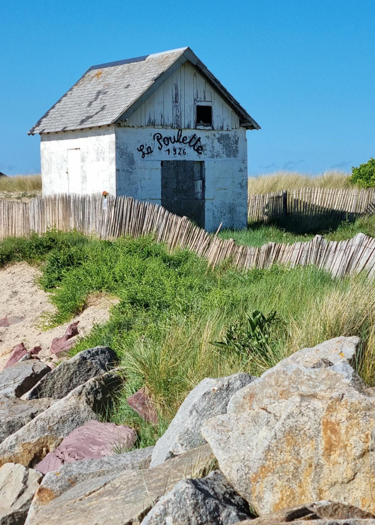 Historic small building representing the evolution of business and franchising over time.