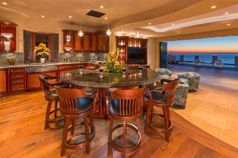 Kitchen Design Services — An Exotic Traditional Kitchen With Rounded Table Design in La Jolla, CA
