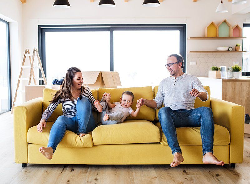 Happy Family On Sofa — Grapevine, TX — Silvas Law, PC