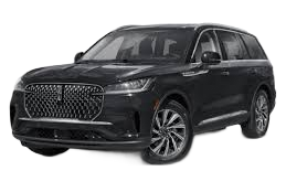 Black Volvo S60 sedan parked on a white surface.