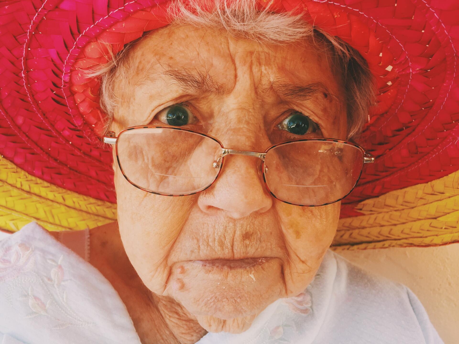 Grandma looking closely at the camera, and perplexed about her fee