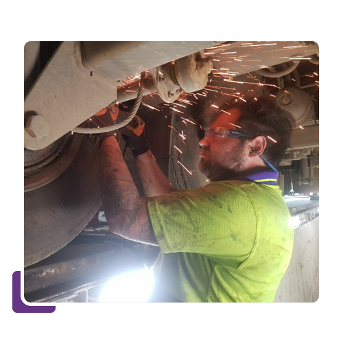 Man Repairing Truck — Leitchville, VIC — Get In Lign