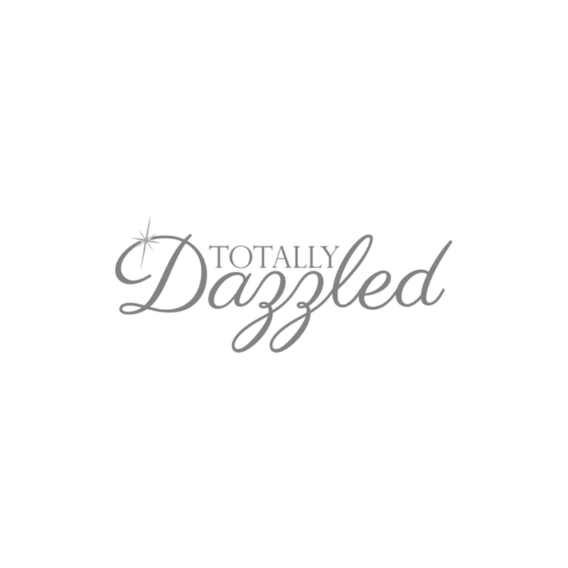 Totally Dazzled logo in gray script with a sparkling element above the word 