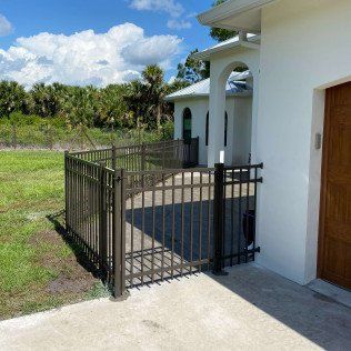 Gray Fence — Naples, FL — Classified Fence and Gate