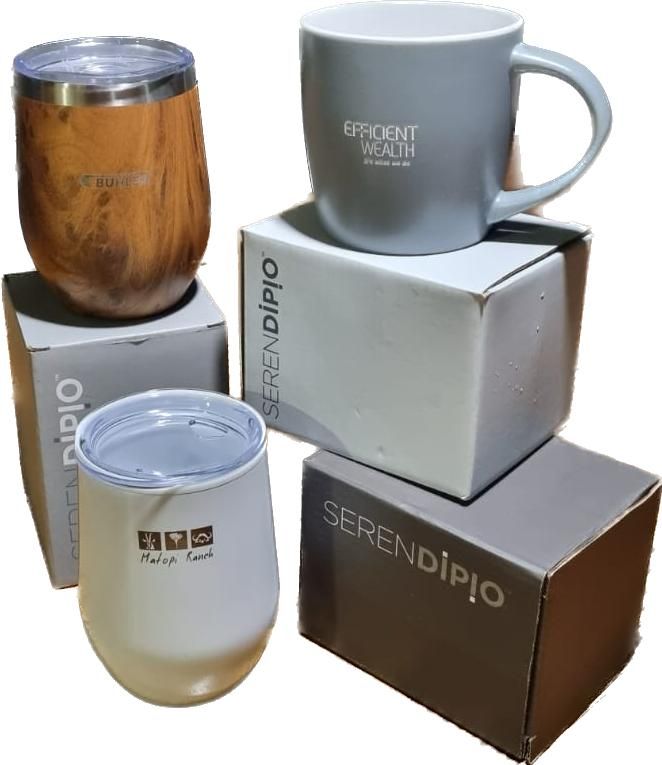 A stack of Serendipio mugs sitting on top of each other as supplied by BlinC Corporate Gifts.