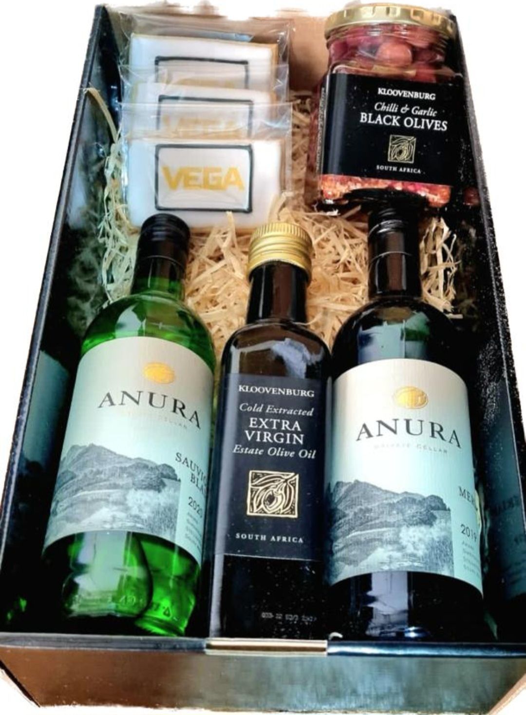 Two bottles of Anura olive oil are in a box as supplied by BlinC Corporate Gifts.