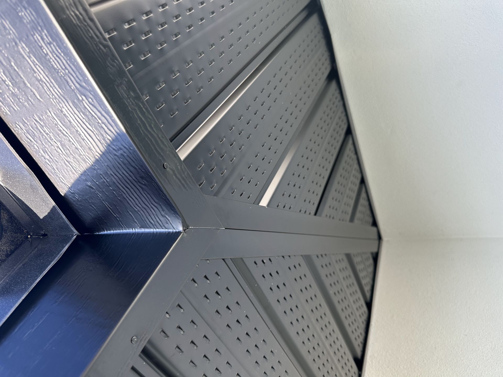 A close up of a black item with holes in it