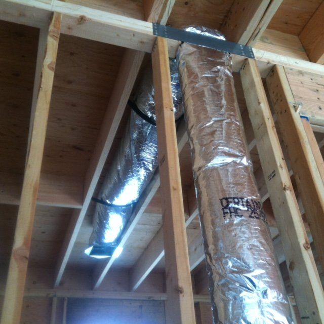A Residential HVAC Service Working on a New Home in Suffolk County, NY