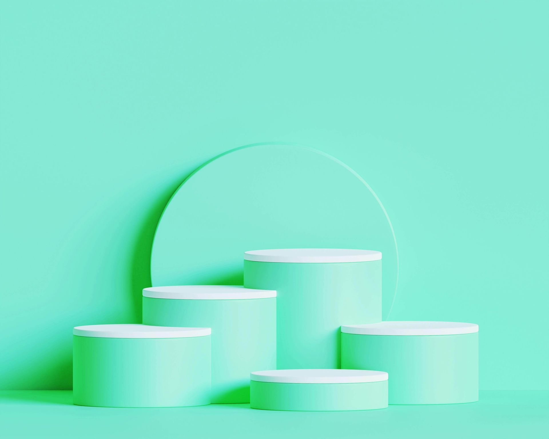 A group of green cylinders with white tops on a green background.