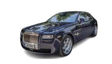 Dark blue Rolls Royce sedan with silver wheels.